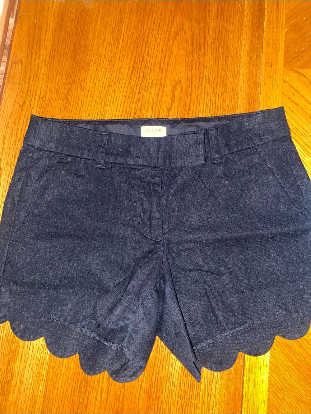 4 pairs of J Crew Scalloped Hem Shorts in multiple colors.